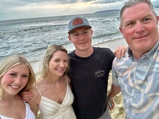 Family photo on the beach in Puerto Vallarta